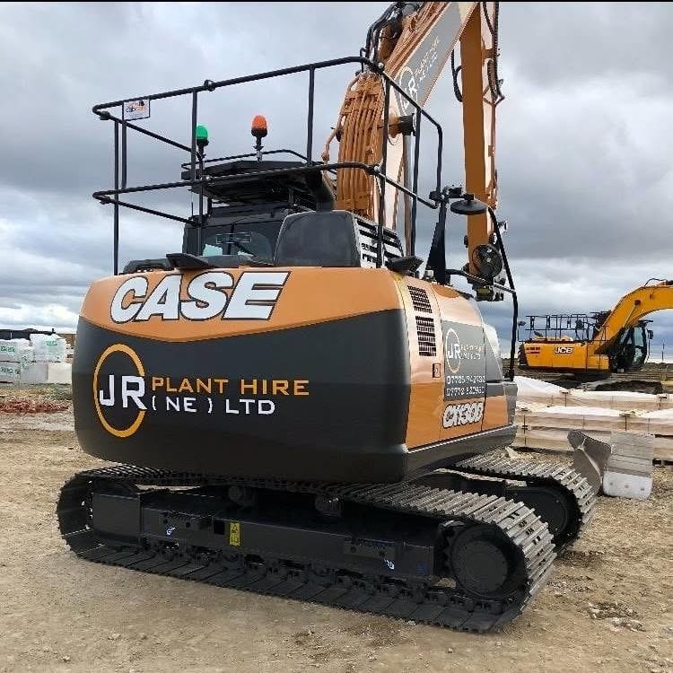 A CASE tracked excavator in JR Plant Hire livery on a development site